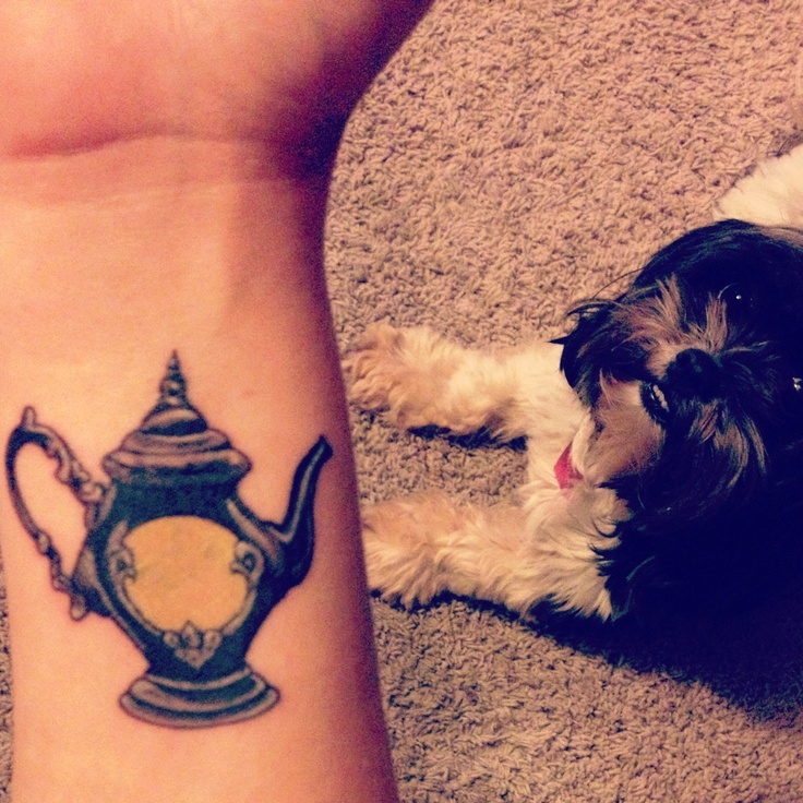 Pretty teapot arm tattoo