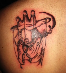 Puppet master back tattoo