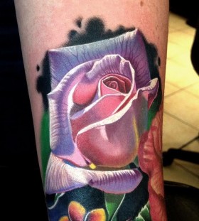 Purple rose tattoo by Phil Garcia