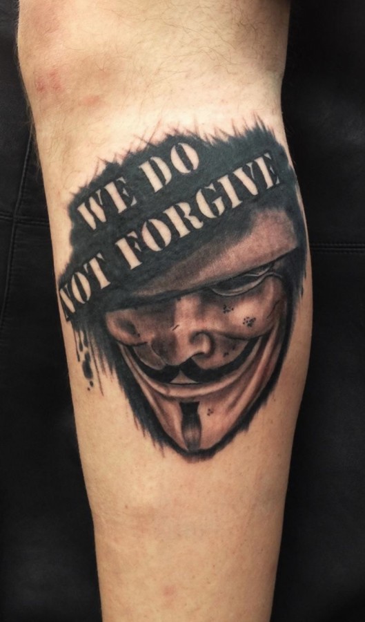 Quote and mask of V tattoo