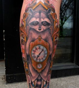 Raccoon and clock tattoo