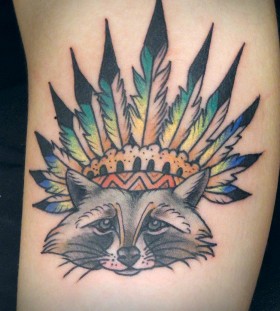 Raccoon wearing a feather hat tattoo