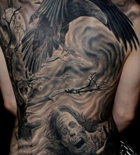 Raven and zombie back tattoo