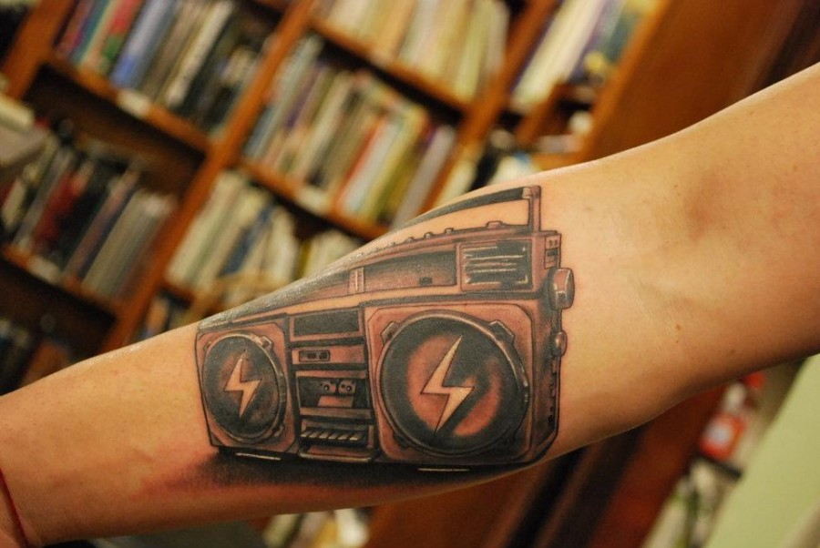 Realistic boombox arm tattoo