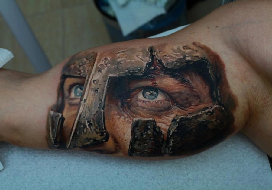 Realistic gladiator tattoo on arm