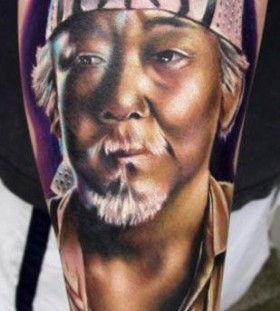 Realistic man tattoo by Kyle Cotterman