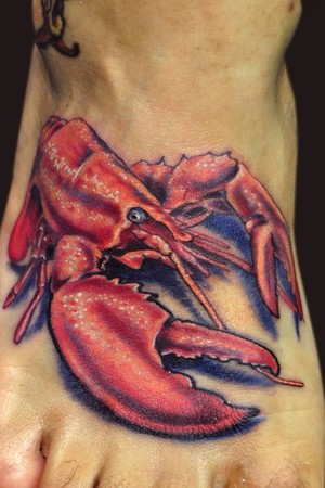 Realistic red lobster foot tattoo