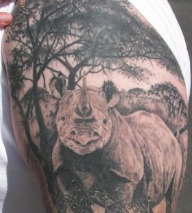 Realistic rhino arm tattoo