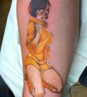 Realistic velma arm tattoo