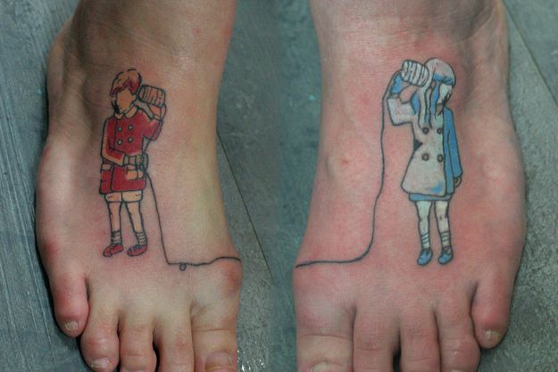 Red and black telephone tattoo