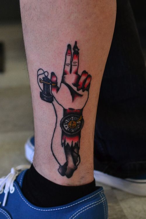 Red fingers telephone tattoo