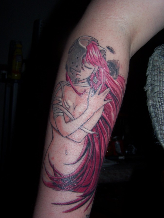 Red hair girl’s anime tattoo