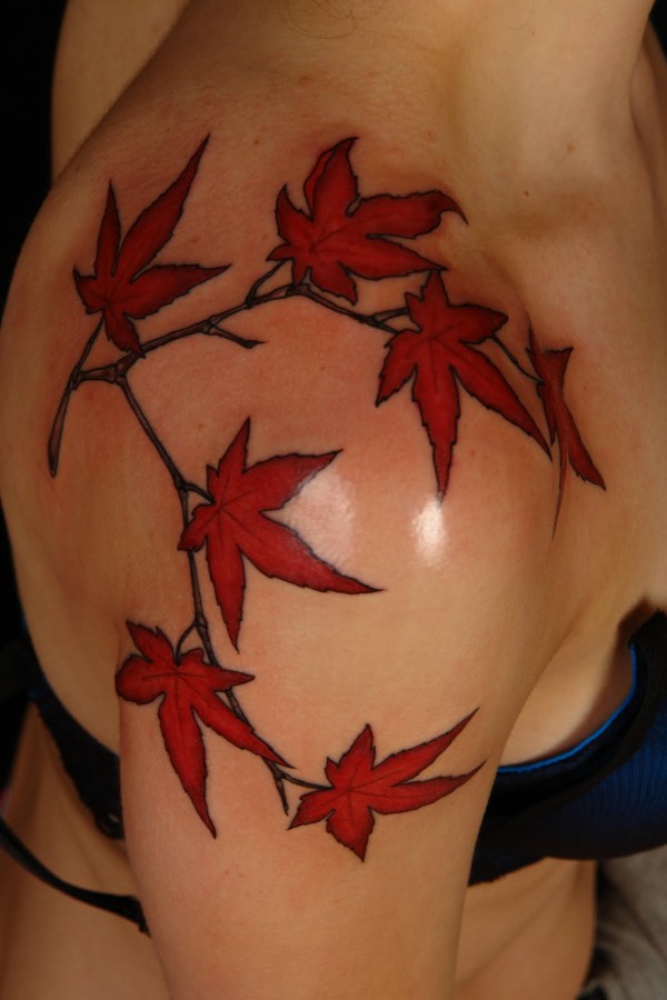 Red maple leaves shoulder tattoo