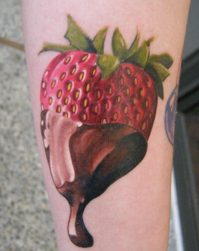 Red strawberry fruit tattoo