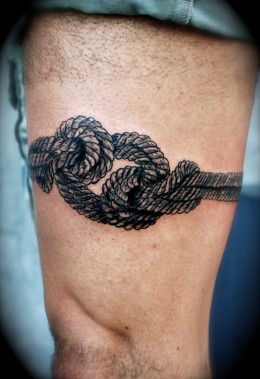 Rope knot leg tattoo