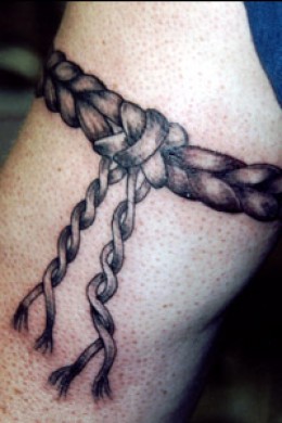 Rope tattoo on arm