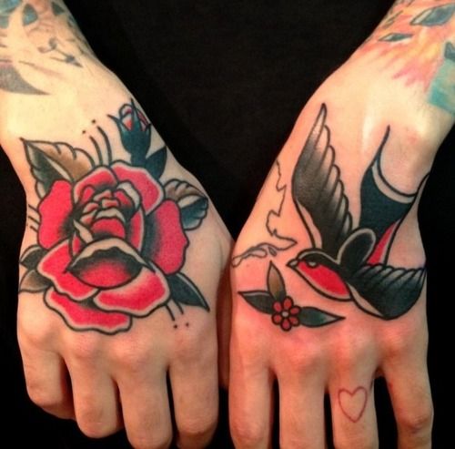 Rose and sparrow hand tattoos by Nick Oaks