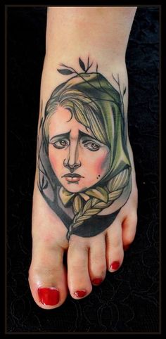 Sad woman foot tattoo