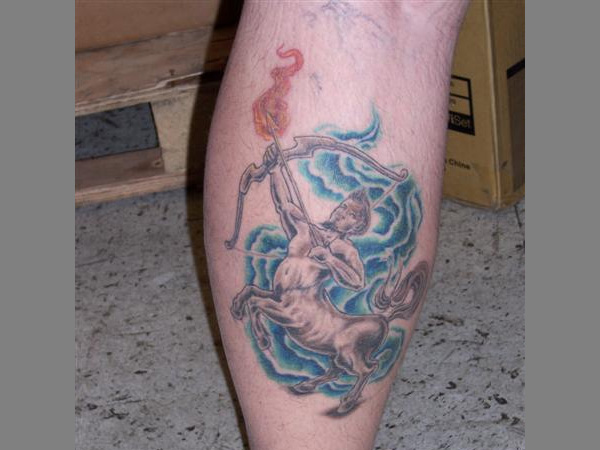 Sagittarius with flaming arrow tattoo