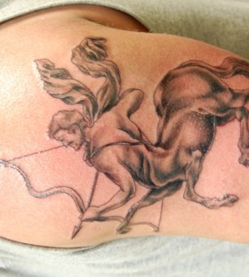 Sagittarius with wings tattoo