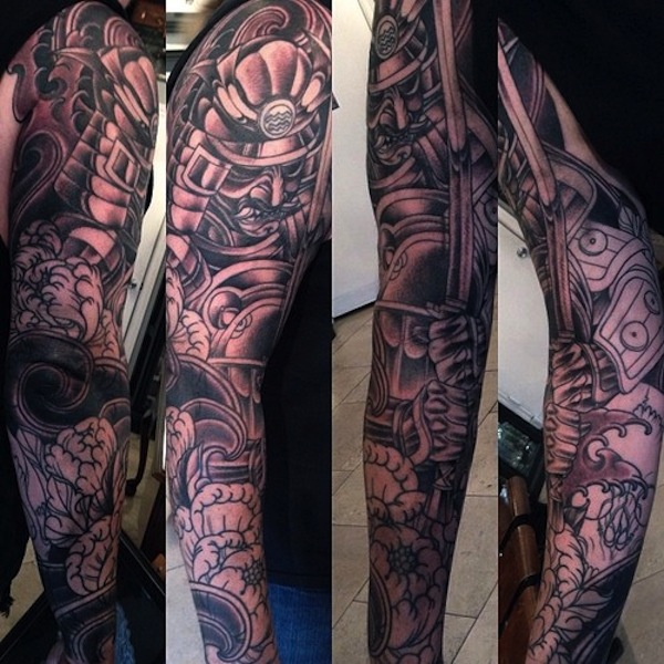 Samurai with sword full arm tattoo