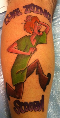 Scared running shaggy tattoo