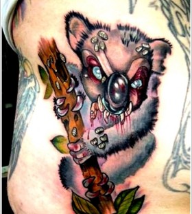 Scary koala bear tattoo