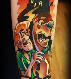 Scooby and shaggy arm tattoo