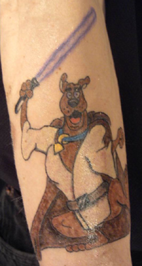 Scooby with a lightsaber tattoo