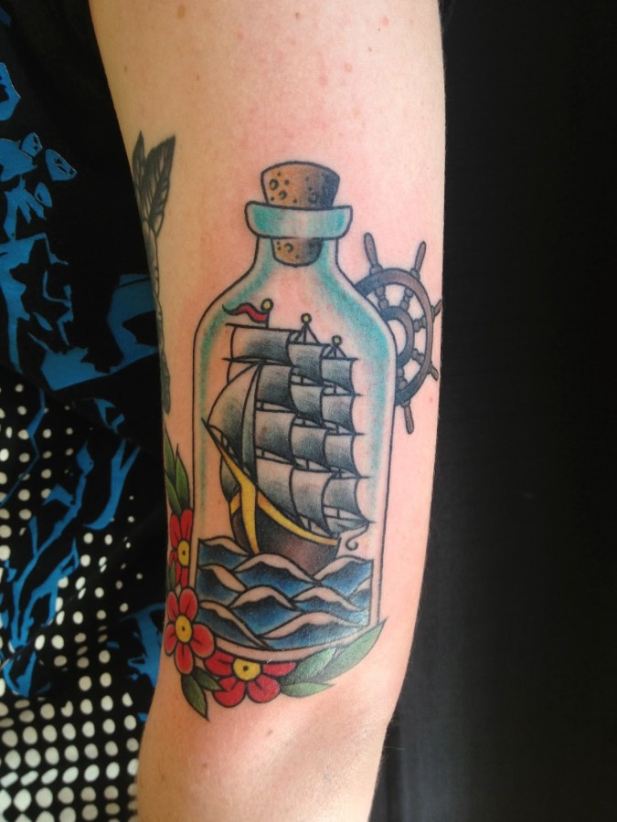 Ship in a bottle arm tattoo