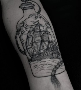 Ship in a bottle tattoo by Thomas Cardiff