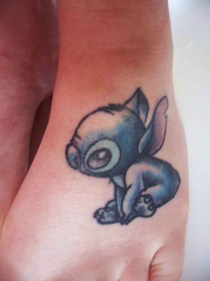 Simple Stitch foot tattoo