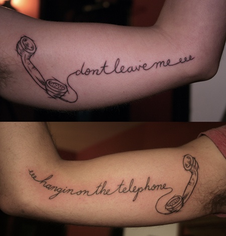 Simple arm’s telephone tattoo