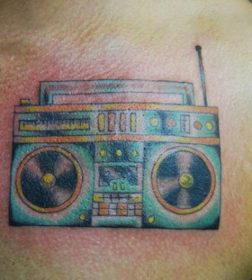 Simple boombox chest tattoo
