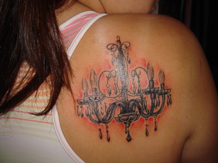 Simple chandelier back tattoo