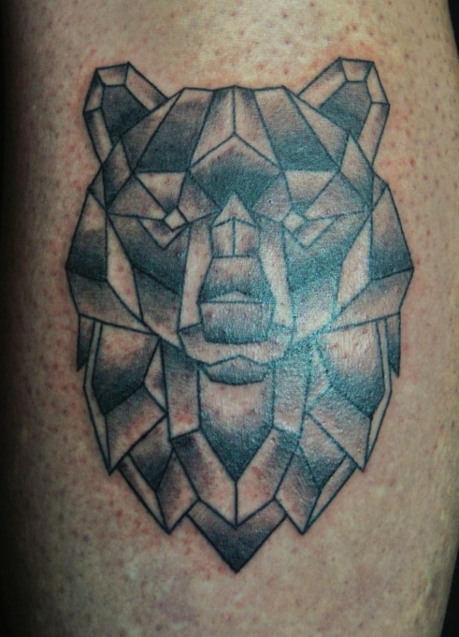 Simple geometrical bear tattoo