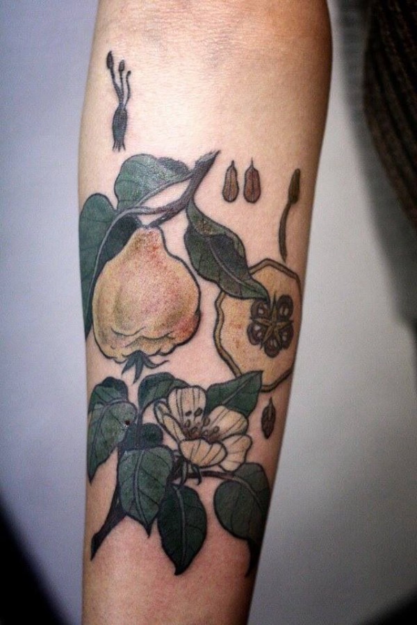 Simple green fruit tattoo
