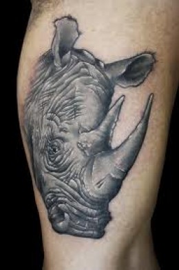 Simple rhino arm tattoo