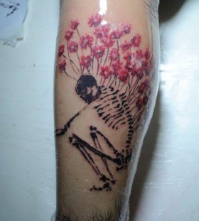 Skeleton and flowers tattoo by Tyago Compiani