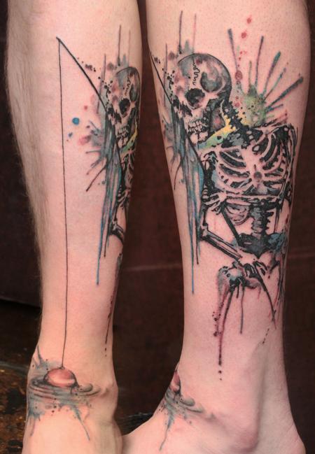 Skeleton fishing leg tattoo