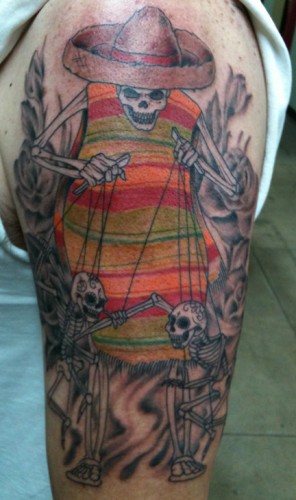 Skeleton puppet master tattoo