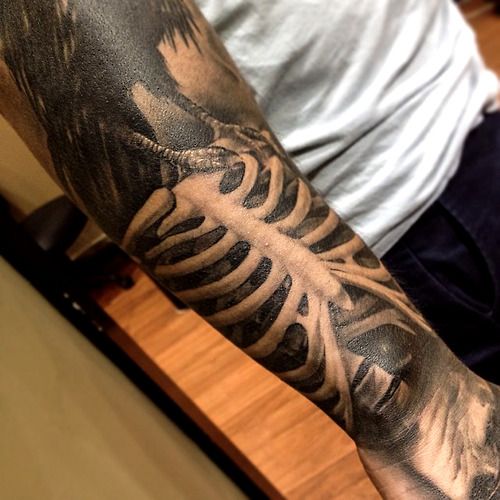 Skeleton tattoo by Benjamin Laukis