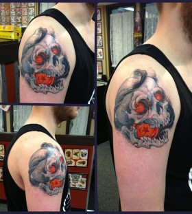 Skull and dragon ball tattoo