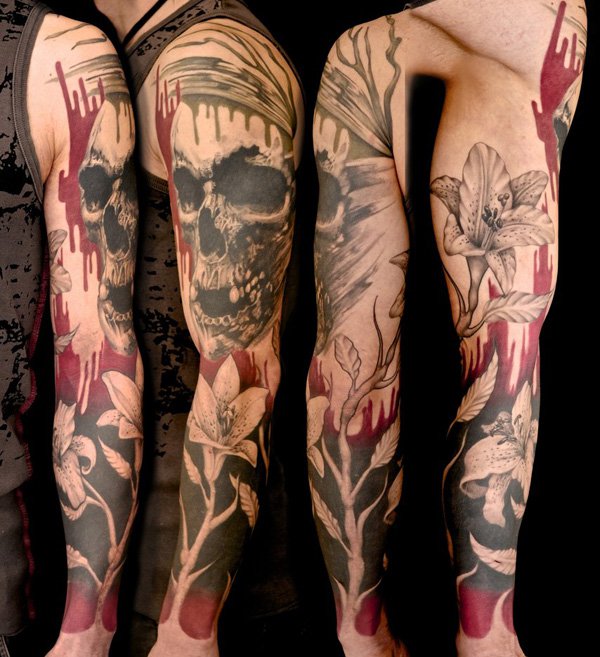 Skull and flowers full arm tattoo