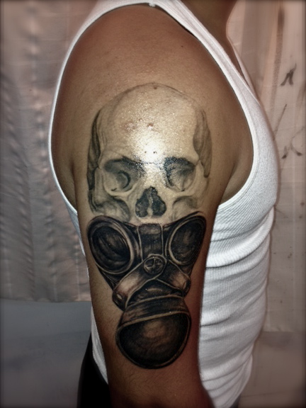 Skull and gas mask tattoo