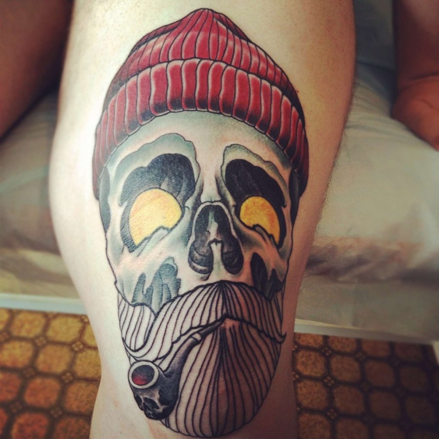 Skull smoking a pipe tattoo