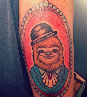 Sloth with a hat tattoo