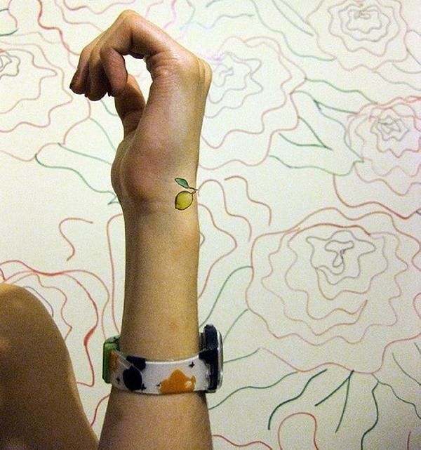 Small lemon’s fruit tattoo