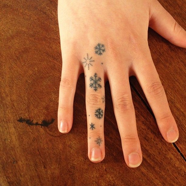 Small snowflakes christmas tattoo