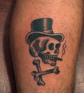 Smoking skull leg tattoo